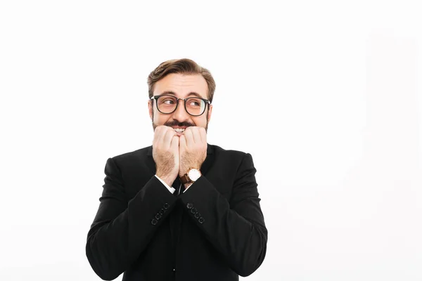 Hombre de negocios confundido mirando a un lado . —  Fotos de Stock