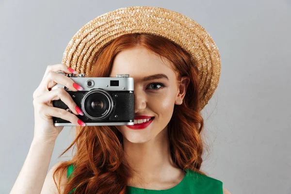 Redhead young cheerful happy lady photographer — Stock Photo, Image