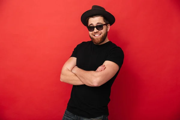 Portrait of irresistible stylish man 30s in hat and sunglasses s — Stok Foto