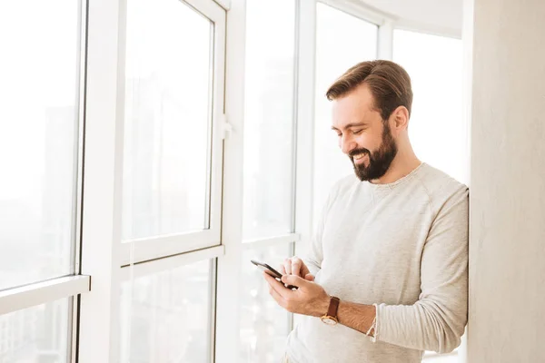 Photo of relaxed guy 30s having beard and mustache, spending tim — Stock Photo, Image