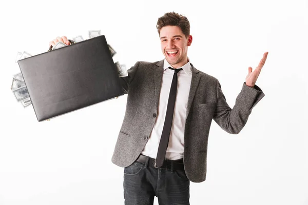 Portrait of a happy young businessman showing — Stock Photo, Image