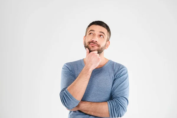 Thinking young man standing isolated — Stock Photo, Image