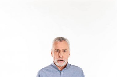 Shocked man looking camera while posing isolated over white