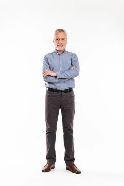 Old grey-haired man with folded hands and smiling to camera isolated — Stock Photo, Image