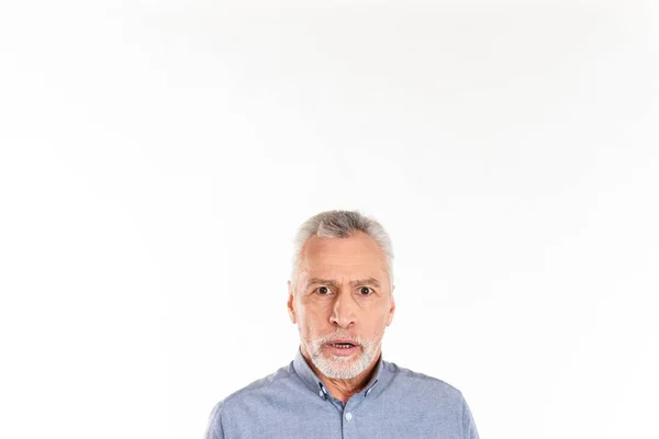 Shocked man looking camera while posing isolated over white — Stock Photo, Image