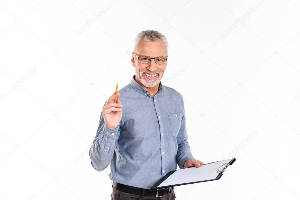 Cheerful man holding folder and smiling to camera