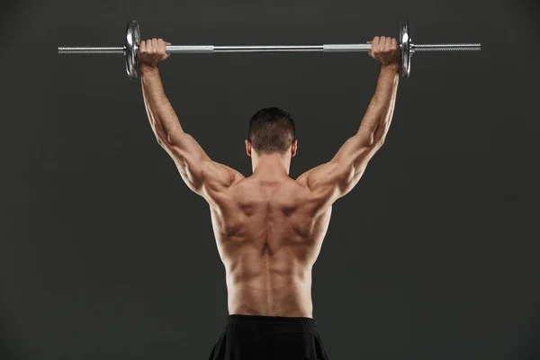 フィット筋肉ボディービルダーの背面図 — ストック写真