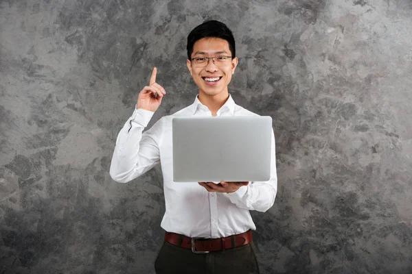 Portrait of a happy young asian man — Stock Photo, Image