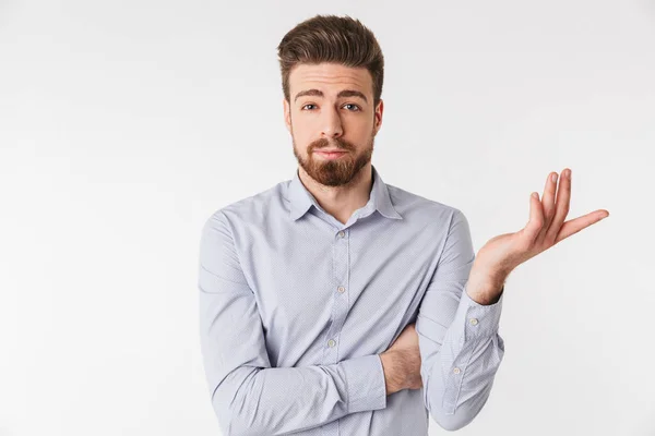 Portrait d'un jeune homme confus habillé en chemise — Photo