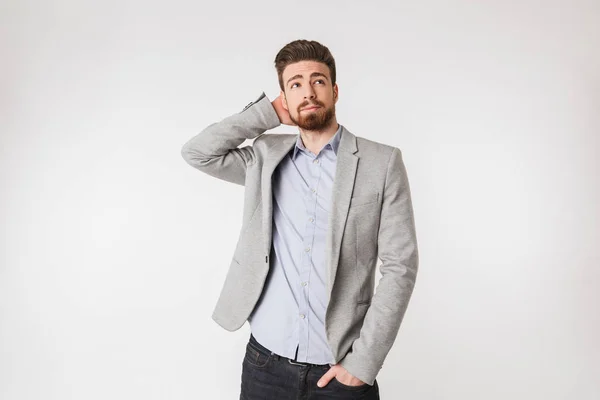 Portrait of a pensive young man dressed in shirt — Stock Photo, Image