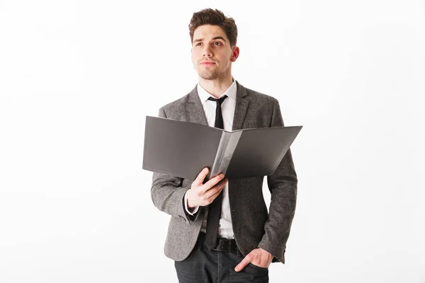 Young business man in jacket and eyeglasses holding folder — Stock Photo, Image