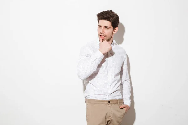 Portrait of a handsome young man dressed in shirt — Stock Photo, Image