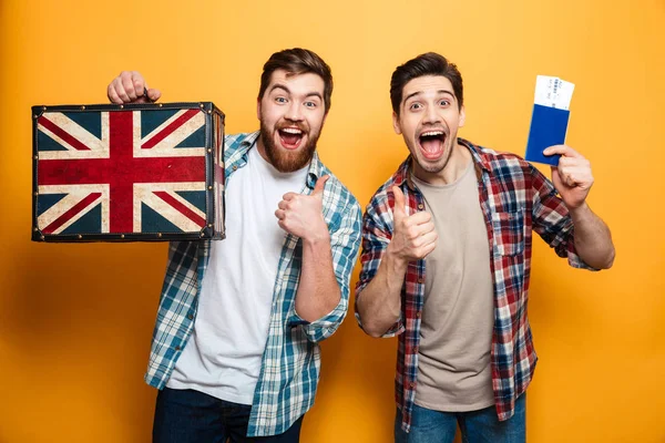 Two happy intrigued menn in shirts preparing to trip — Stock Photo, Image