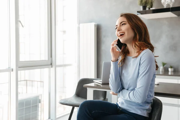 Portrait of a cheerful young woman