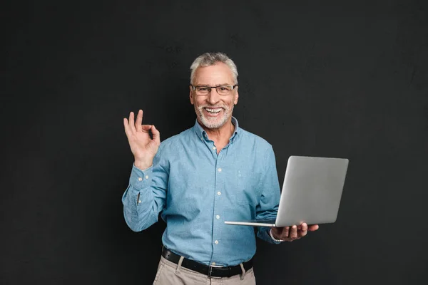 Portrait of a cheerful mature man dressed in shirt — Stock Photo, Image