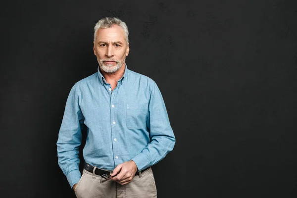 Portrait of a smiling mature man dressed in shirt — Stock Photo, Image