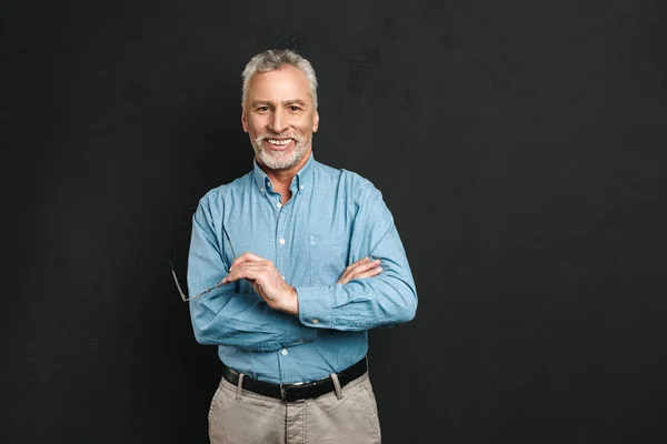 Portrait of caucasian male pensioner 60s with grey hair and bear — Stock Photo, Image