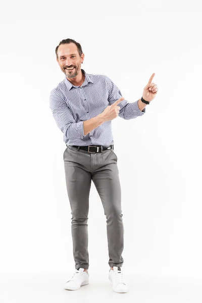 Happy handsome adult businessman pointing. — Stock Photo, Image
