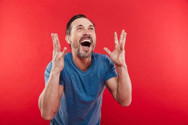 Photo of ecstatic man screaming and rejoicing with gesturing lik clipart