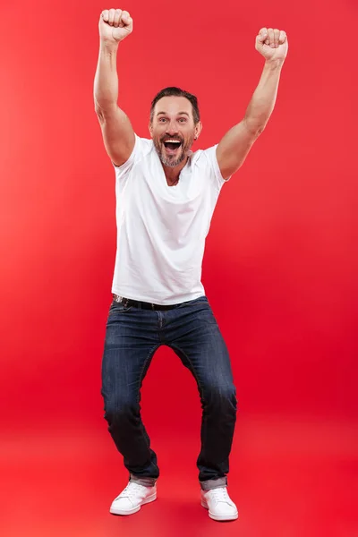 Excited happy adult man make winner gesture. — Stock Photo, Image