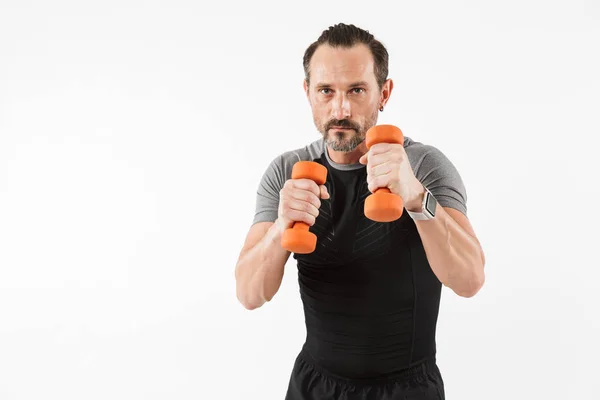 Portret van een zeker volwassen sporter doen oefeningen — Stockfoto