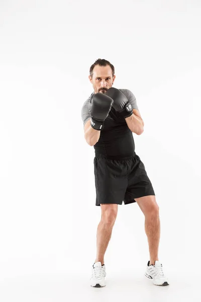 Full length portrait of a strong mature sportsman — Stock Photo, Image