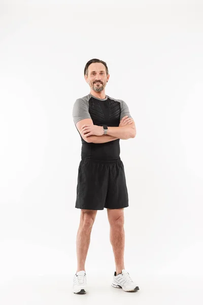 Full length portrait of a happy mature sportsman — Stock Photo, Image