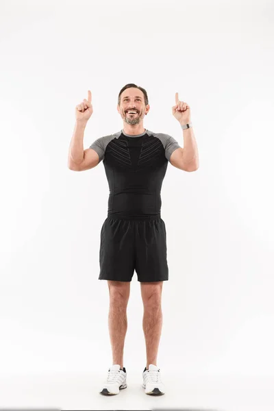 Full length portrait of an excited mature sportsman — Stock Photo, Image