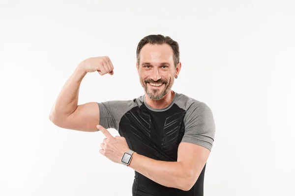 Portrait of caucasian sportsman 30s wearing smartwatch and t-shi — Stock Photo, Image