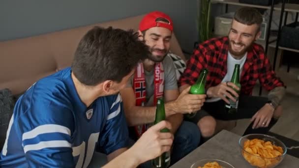 Three Happy Men Fans Drinking Beer While Having Fun Watching — Stock Video