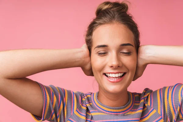 Image closeup of cheerful beautiful woman smiling and covering h — Stock Photo, Image