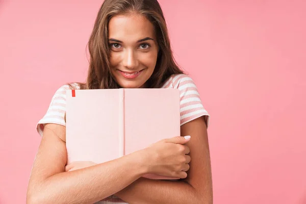 Image closeup of positive pretty woman smiling at camera while h — Stock Photo, Image