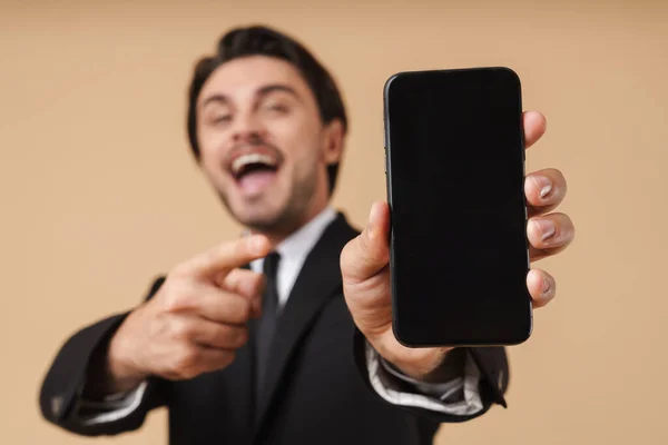 Portrait of a handsome young businessman wearing suit — Stock Photo, Image