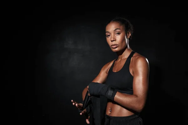 Image of attractive african american woman wearing boxing hand wraps — Stock Photo, Image