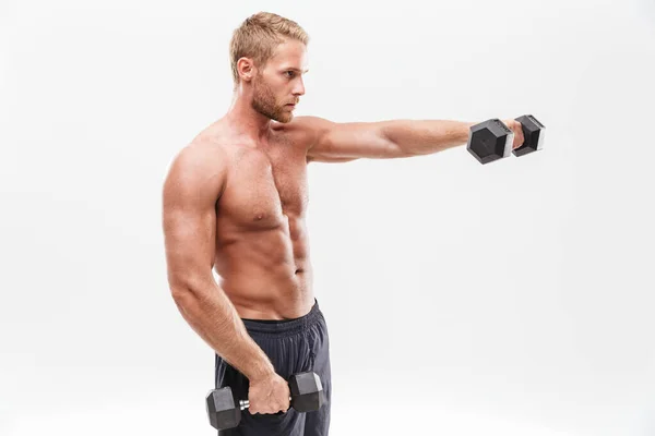 Självsäker attraktiv ung muskulös idrottsman stående — Stockfoto