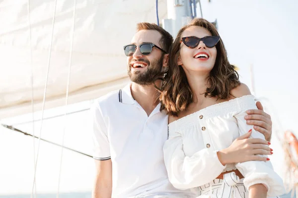 Optimistic cheery young loving couple outdoors — Stock Photo, Image