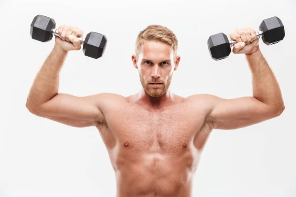 Confident attractive young muscular sportsman standing — Stock Photo, Image