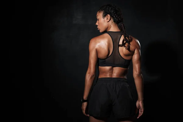 Imagem da parte de trás da mulher americana africana atlética em sportswear — Fotografia de Stock