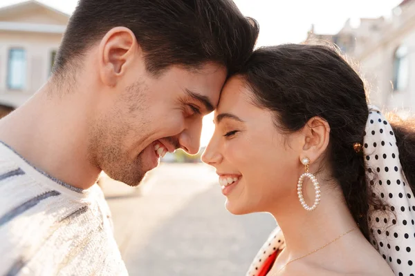Image closeup of happy caucasian couple smiling head to head — Stock Photo, Image