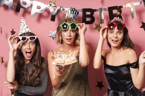 Image of excited party girls in glamour sunglasses holding birth — ストック写真