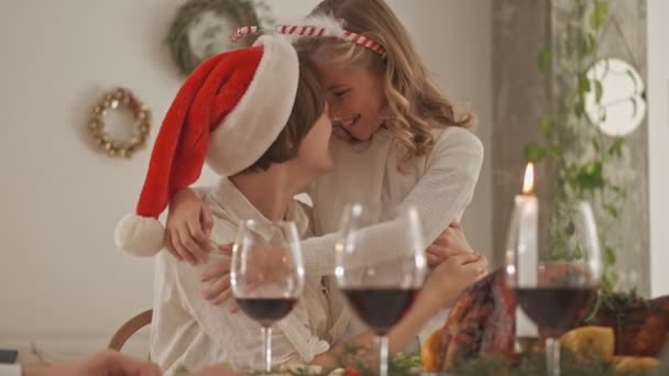 Satisfied Mother Daughter Wearing Christmas Outfit Having Fun Together Hugging — Stockvideo