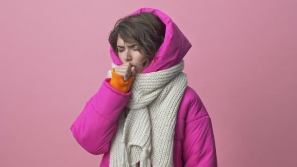 Unhealthy Young Woman Wearing Winter Jacket Scarf Coughing Isolated Pink — ストック動画