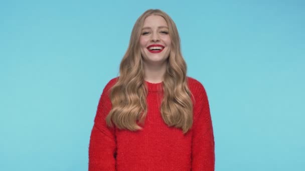 Happy Pretty Woman Sweater Laughing Looking Camera Turquoise Background — Stock Video