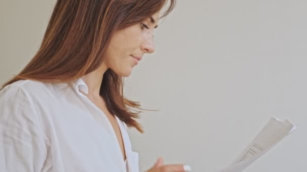 Side View Serious Business Woman Reading Documents While Standing Office — 비디오