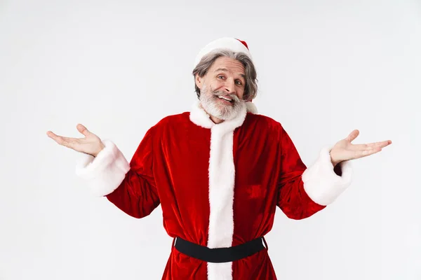 Immagine di Babbo Natale uomo in costume rosso scrollando le spalle e gettando u — Foto Stock