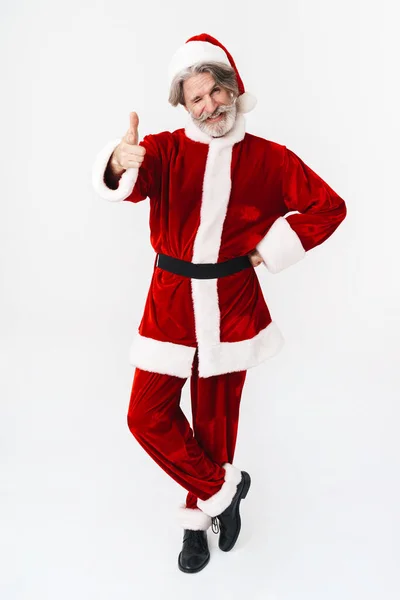 Image pleine longueur du Père Noël homme en costume rouge montrant le thum — Photo