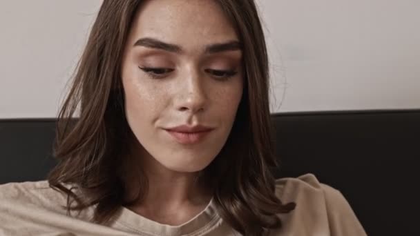 Close View Happy Brunette Woman Looking Away While Sitting Sofa — 비디오