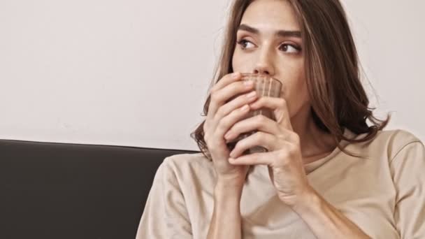 Close View Smiling Pretty Brunette Woman Drinking Cocoa Looking Away — Stock Video