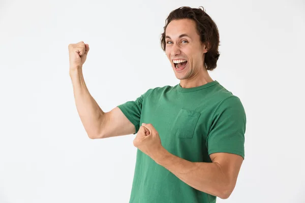 Bild av upphetsad ung man skriker och gester som vinnare — Stockfoto