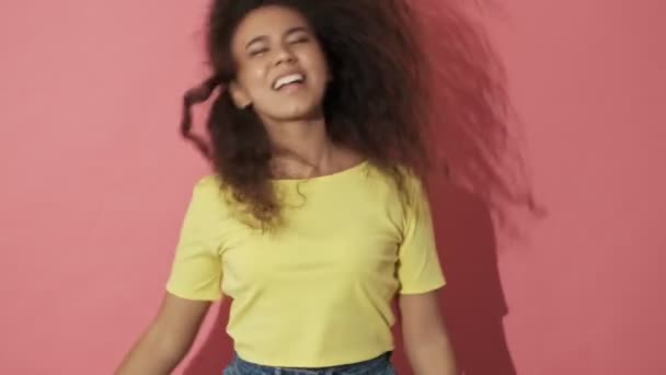 Cheerful Pretty Curly Woman Having Fun Dancing Pink Background — 비디오